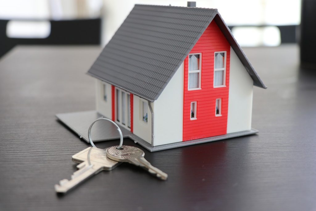 a toy house with a key chain
