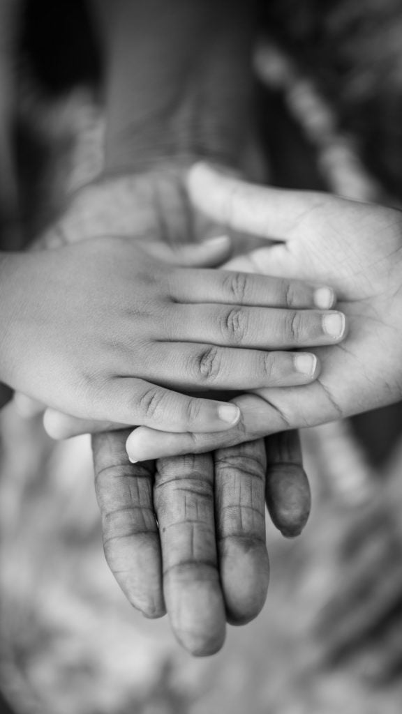 a person holding a baby