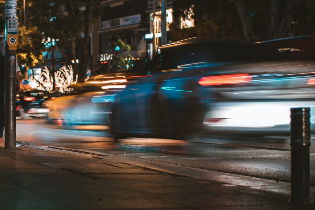 a blurry city street at night