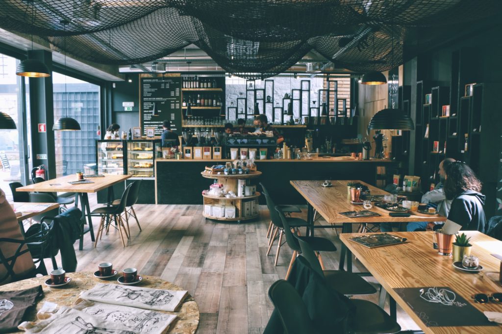 a room with tables and chairs