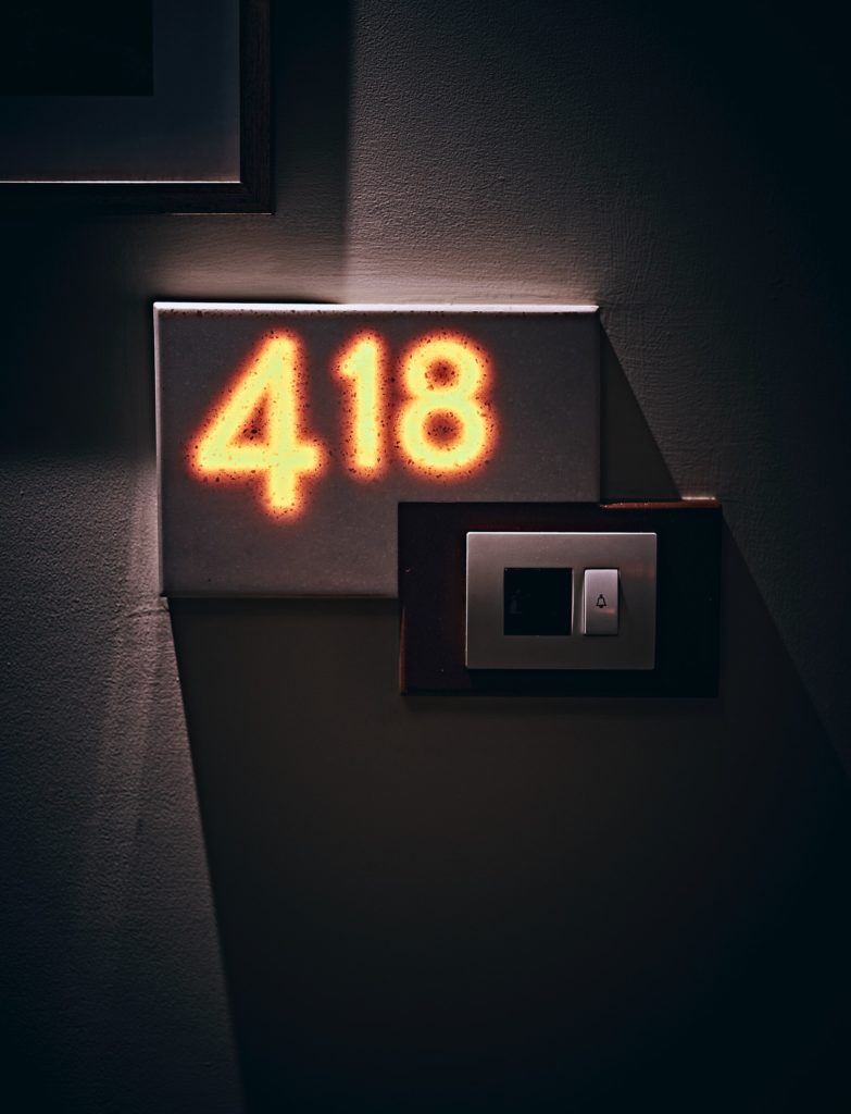 a lit up sign on a wall