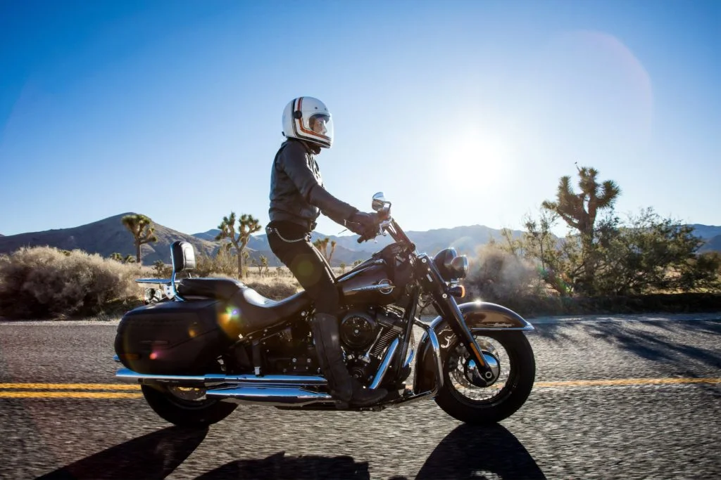 a man riding a motorcycle