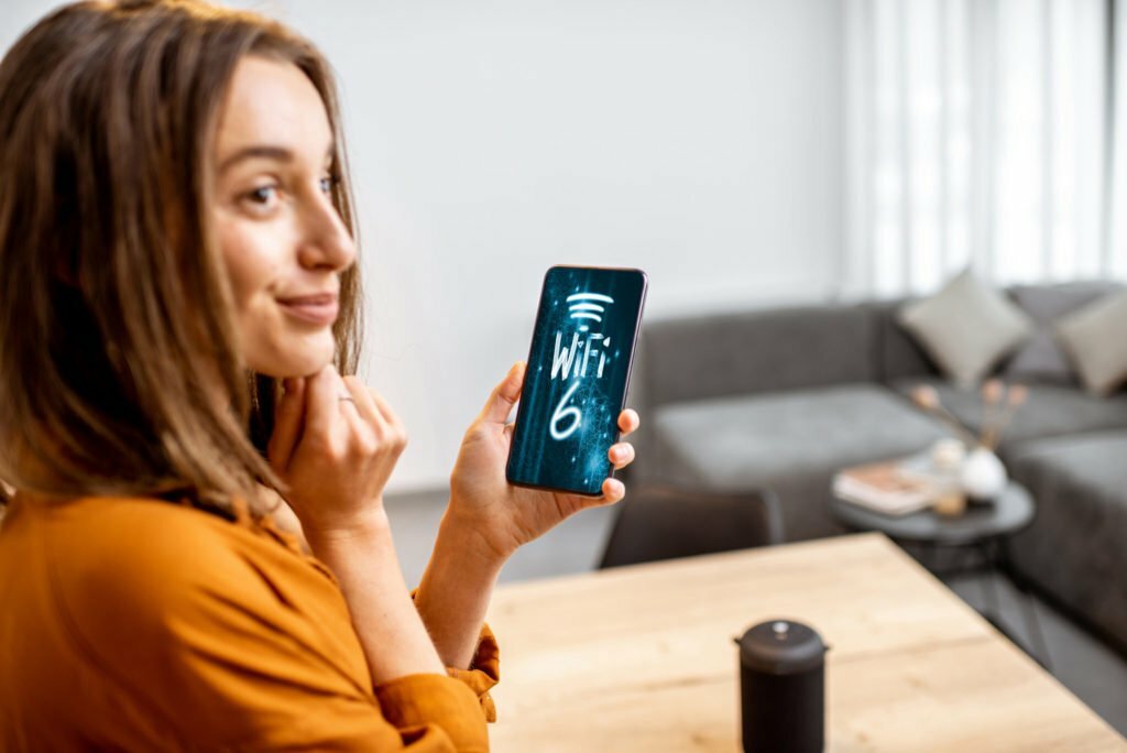 a woman holding a phone