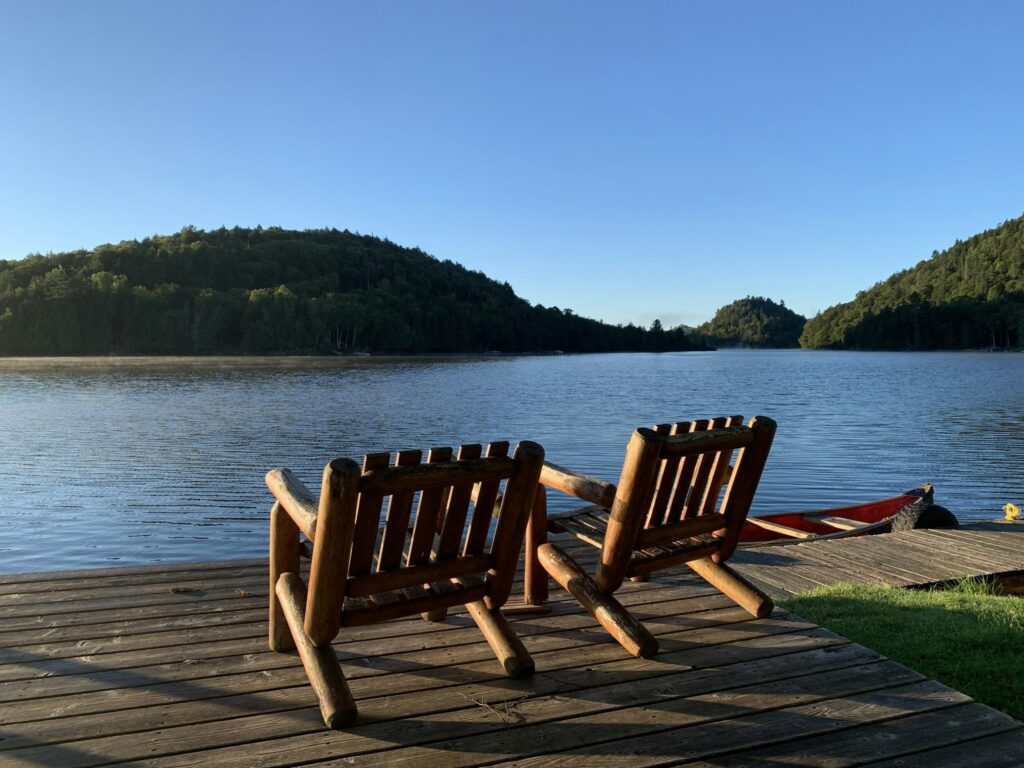 two chairs on a dock