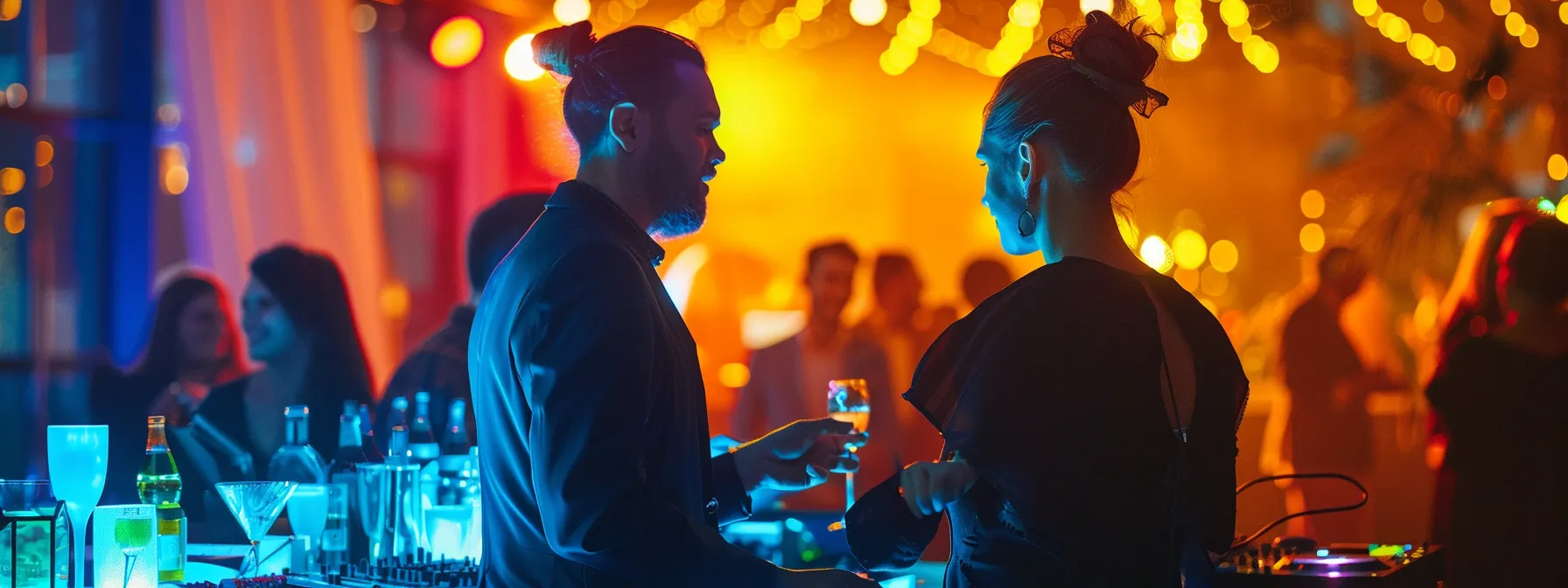 business professionals are engaged in a focused discussion about enhancing wedding experiences through a professional dj.